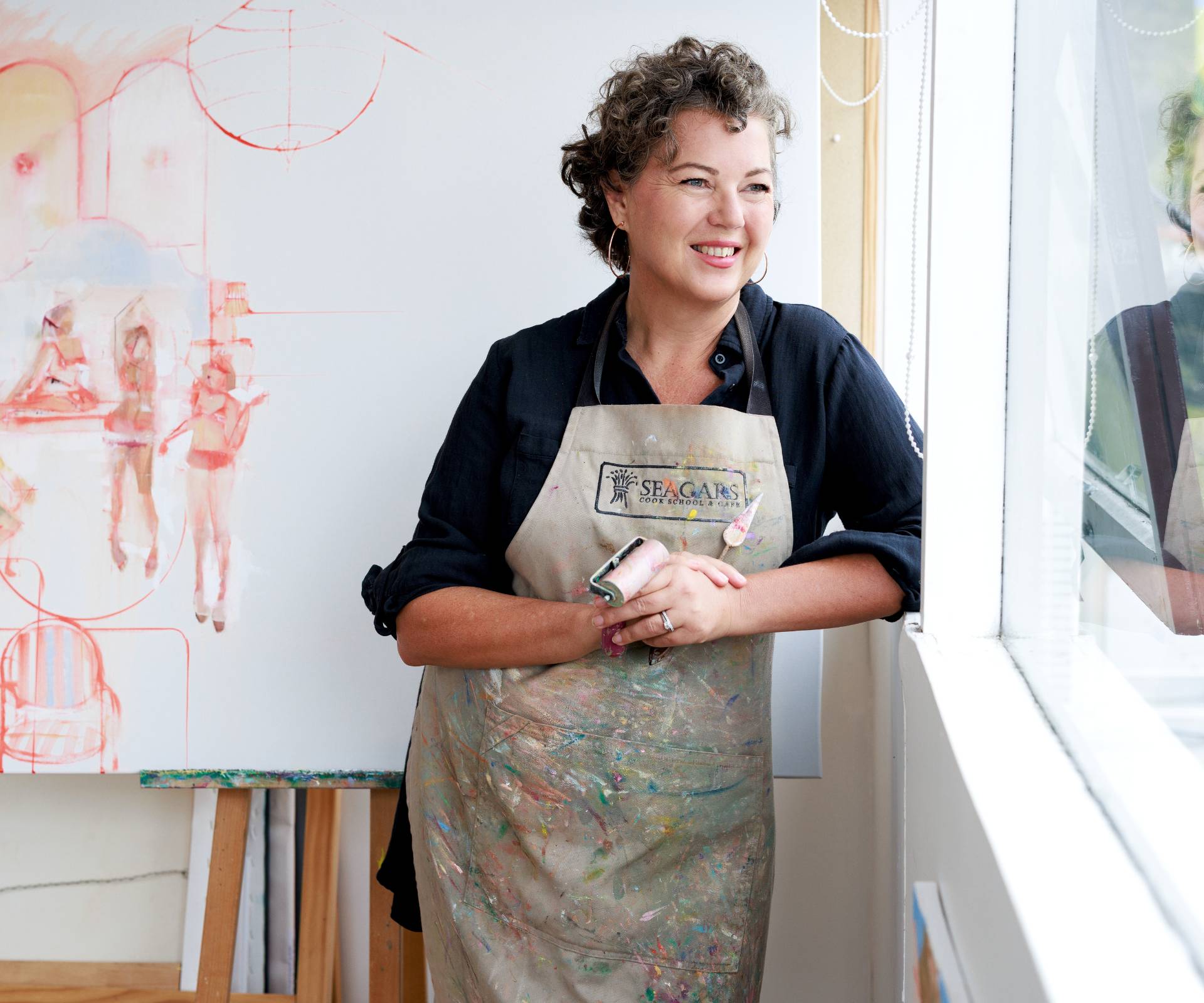 Jenni Stringleman looking out of her studio window